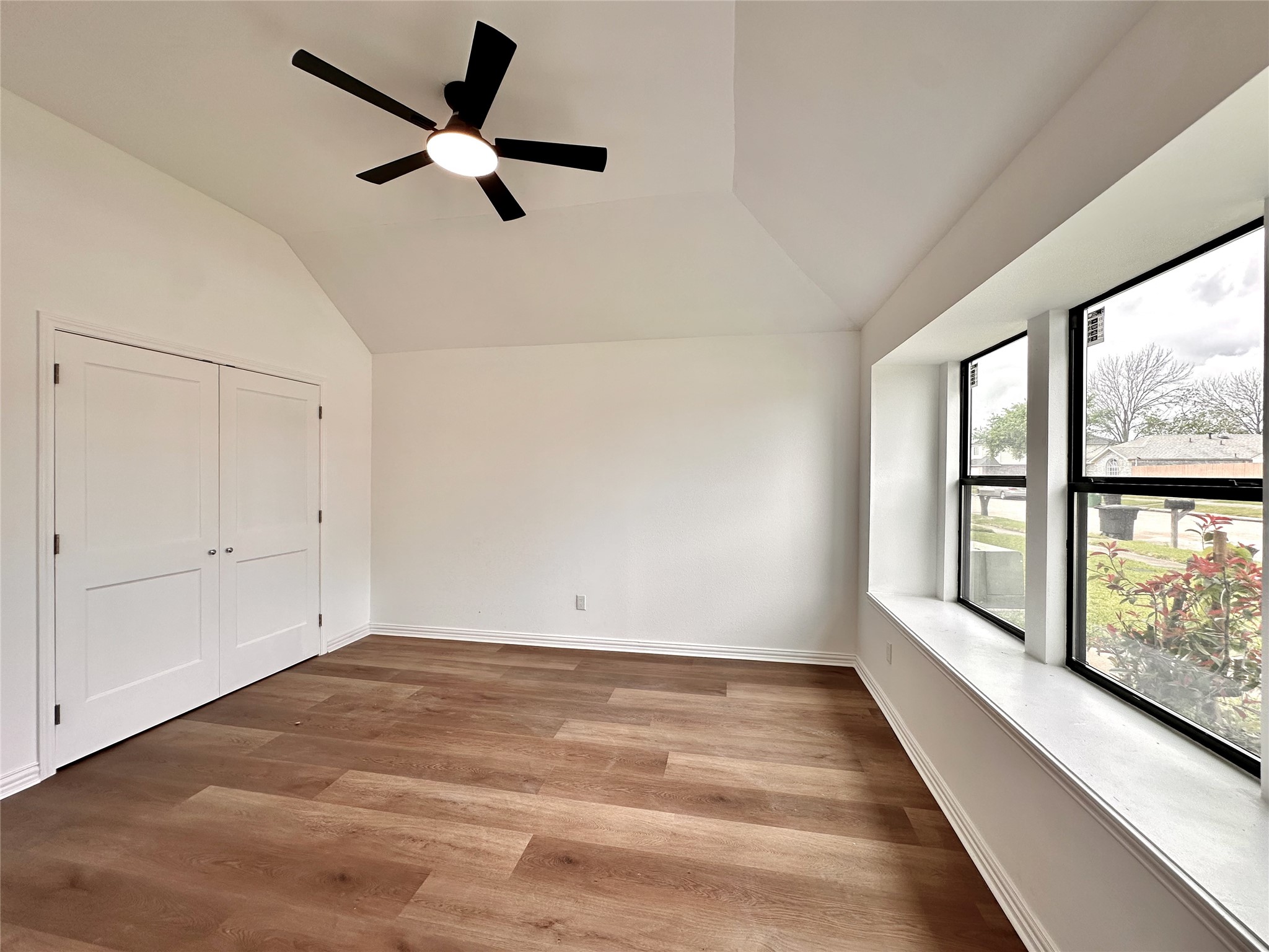 16411 Gold Ridge Lane Houston, TX 77053 - Photo 19 of 25 wooden floor in an empty room with a window