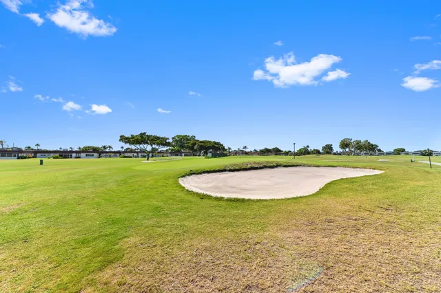 a view of a lake and a yard