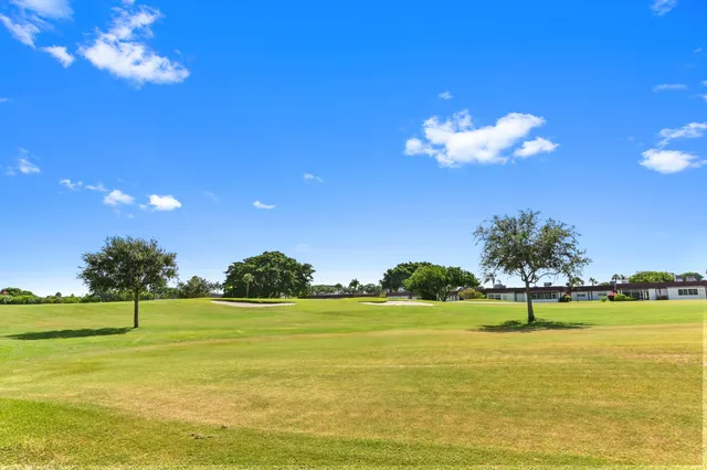 a view of a lake with a big yard
