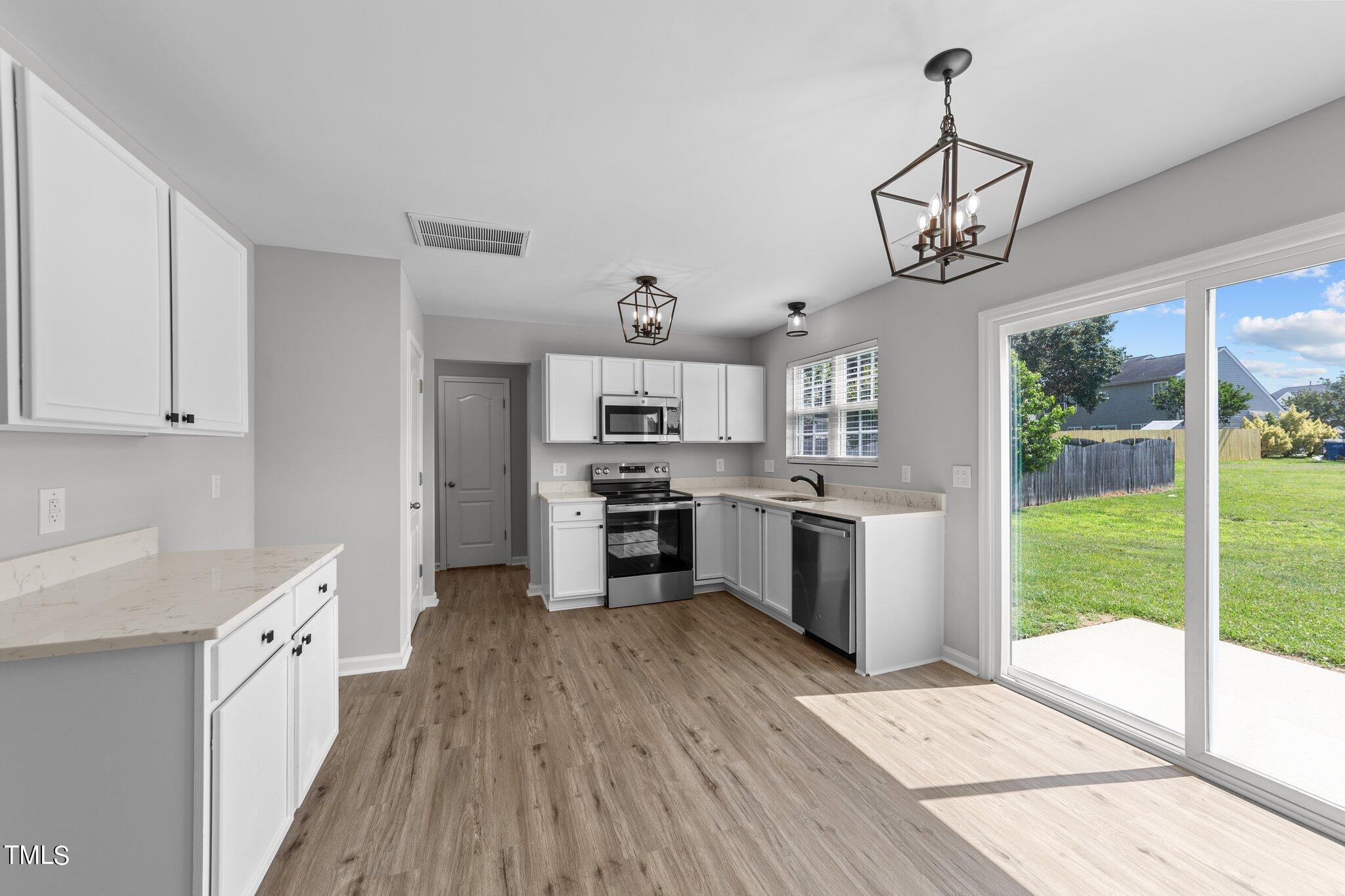 2909 Hayling Drive Raleigh, NC 27610 - Photo 10 of 35 Eat in kitchen