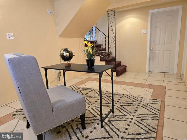 a bathroom with a sink a toilet and a window