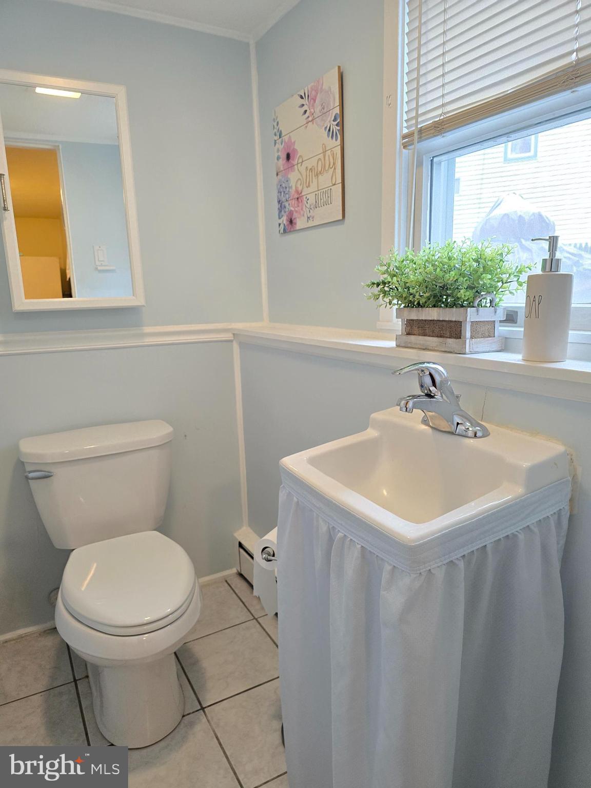 120 East Center Avenue Maple Shade, NJ 08052 - Photo 19 of 34 a bathroom with a sink a toilet and a window