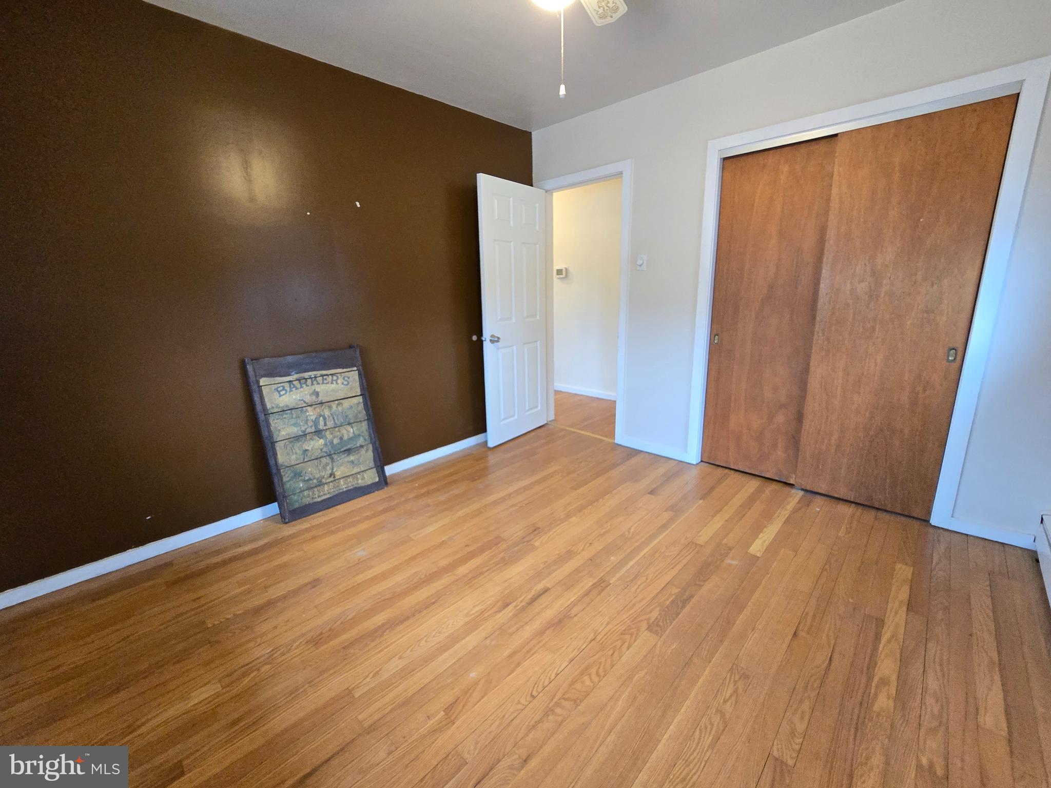 120 East Center Avenue Maple Shade, NJ 08052 - Photo 24 of 34 a view of an empty room with wooden floor
