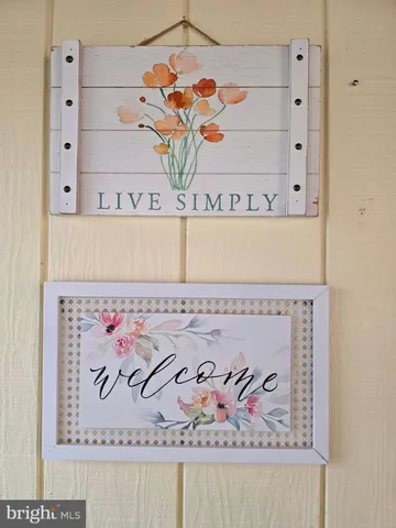 a view of a balcony with furniture