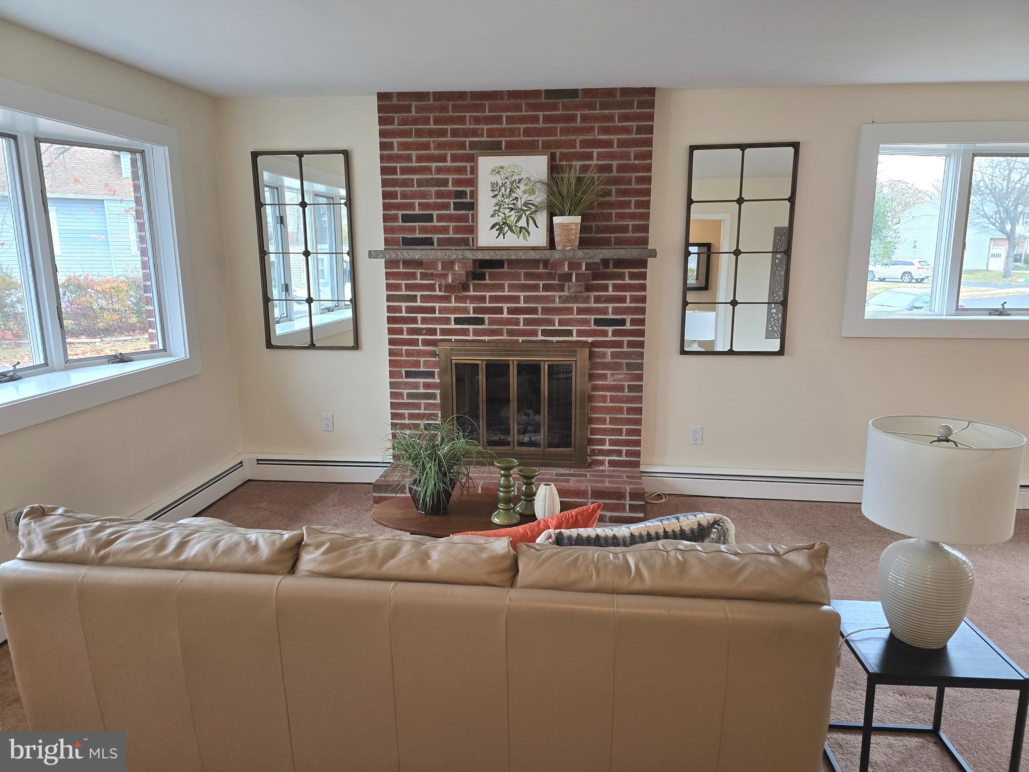 120 East Center Avenue Maple Shade, NJ 08052 - Photo 5 of 34 a living room with furniture and a fireplace