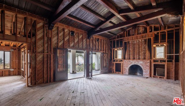 a view of livingroom with furniture and fireplace