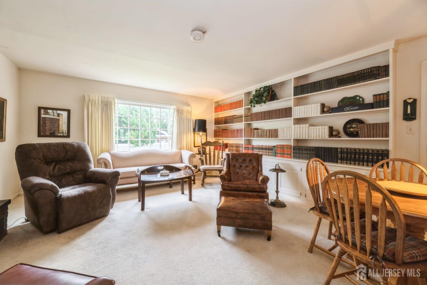 295 Dallas Road North Brunswick, NJ 08902 - Photo 12 of 40 a living room with furniture and a large window