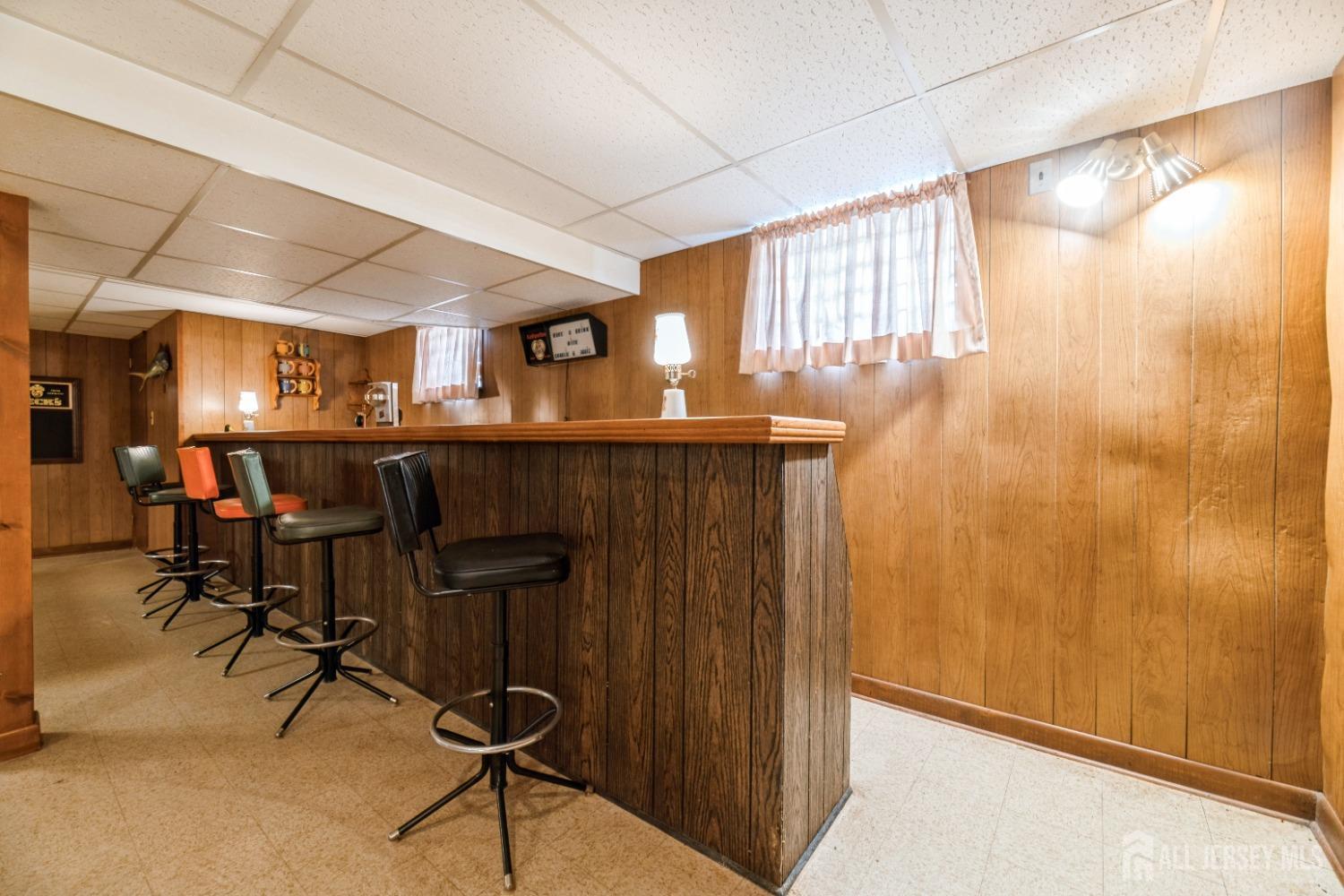 295 Dallas Road North Brunswick, NJ 08902 - Photo 29 of 40 a room with lots of chairs and mirrors