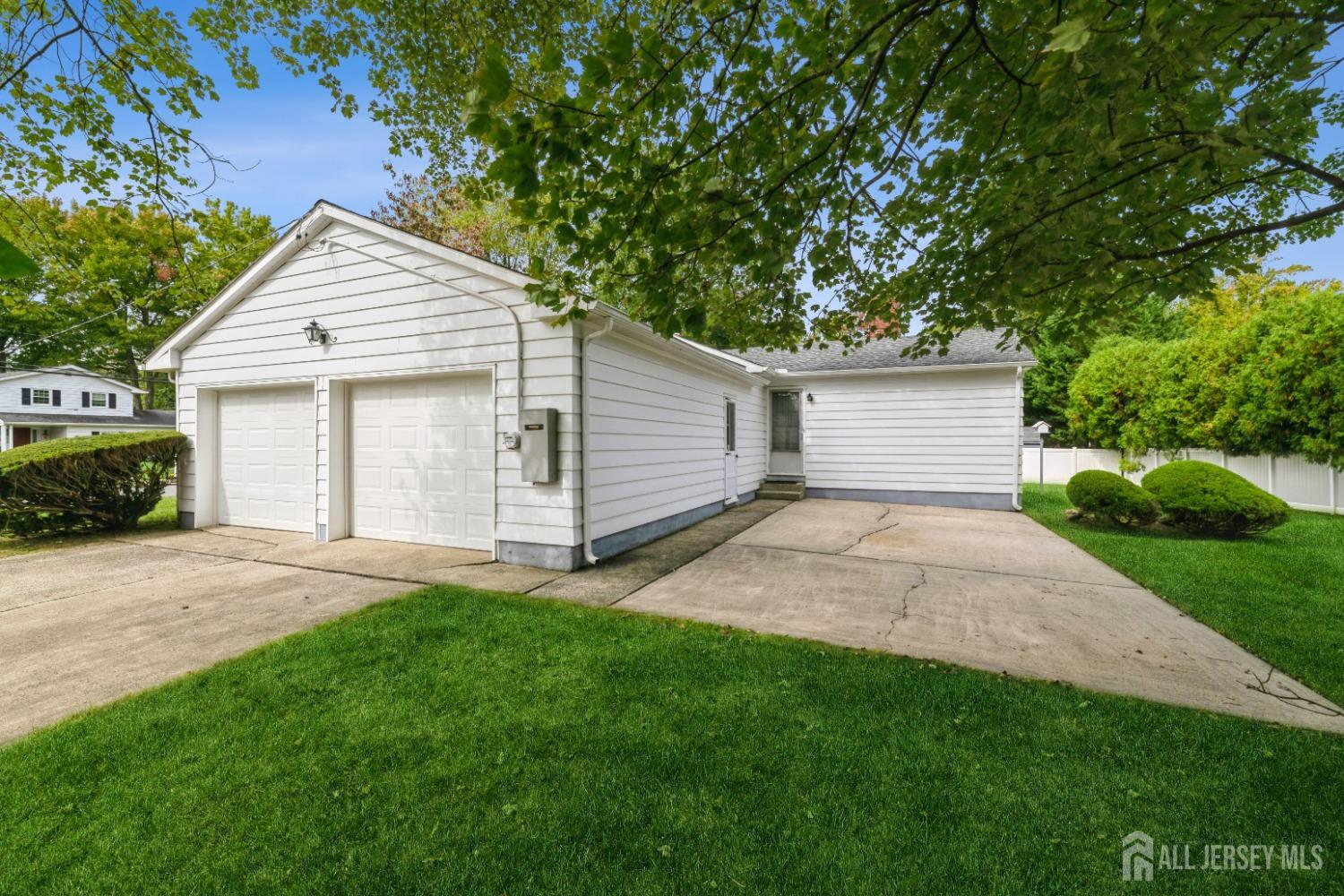 295 Dallas Road North Brunswick, NJ 08902 - Photo 36 of 40 a view of a backyard with a garden