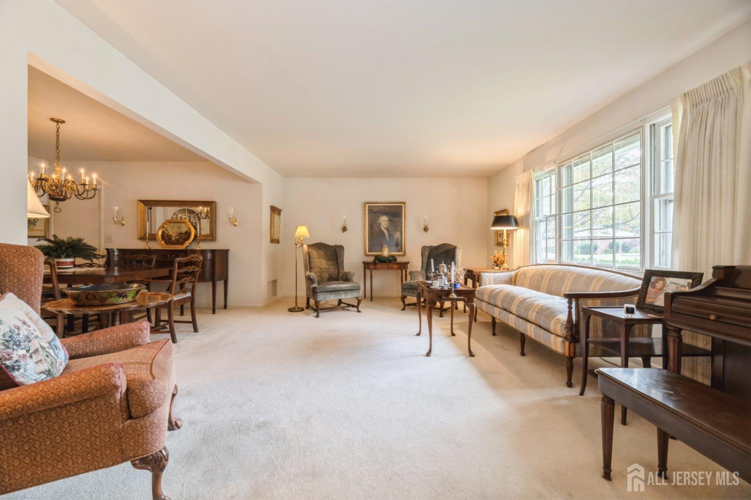 295 Dallas Road North Brunswick, NJ 08902 - Photo 5 of 40 a living room with furniture and a large window