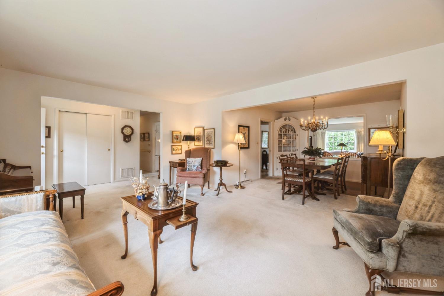 295 Dallas Road North Brunswick, NJ 08902 - Photo 6 of 40 a living room with furniture and a large window
