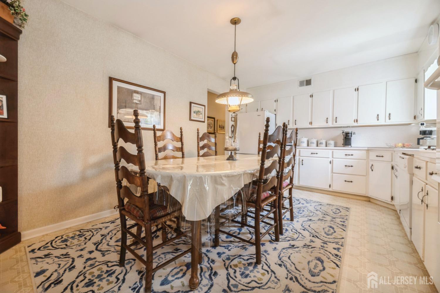 295 Dallas Road North Brunswick, NJ 08902 - Photo 9 of 40 a view of a dining room with furniture