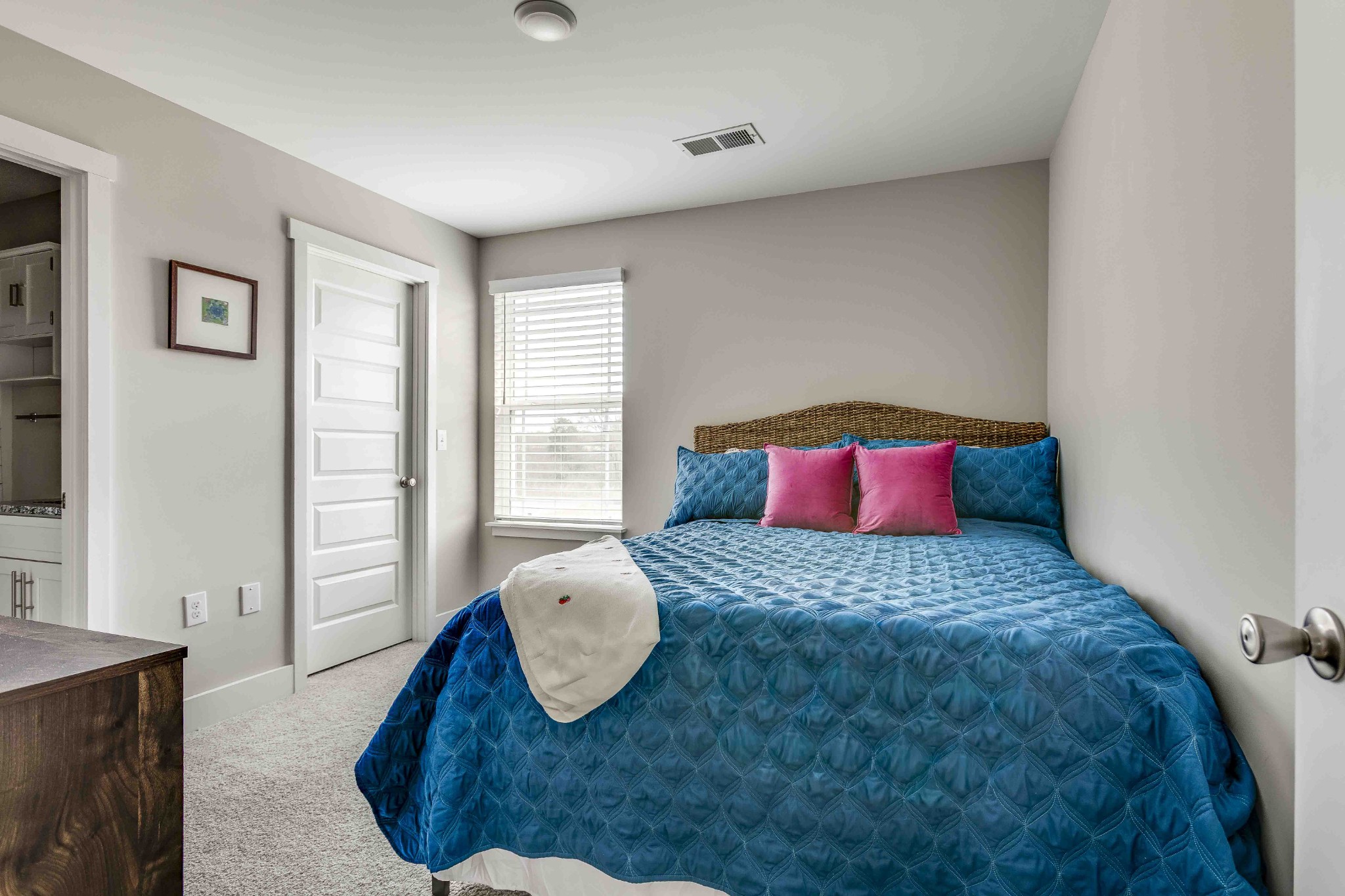 1061 Wells Way Spring Hill, TN 37174 - Photo 18 of 21 a bedroom with a bed and wooden floor