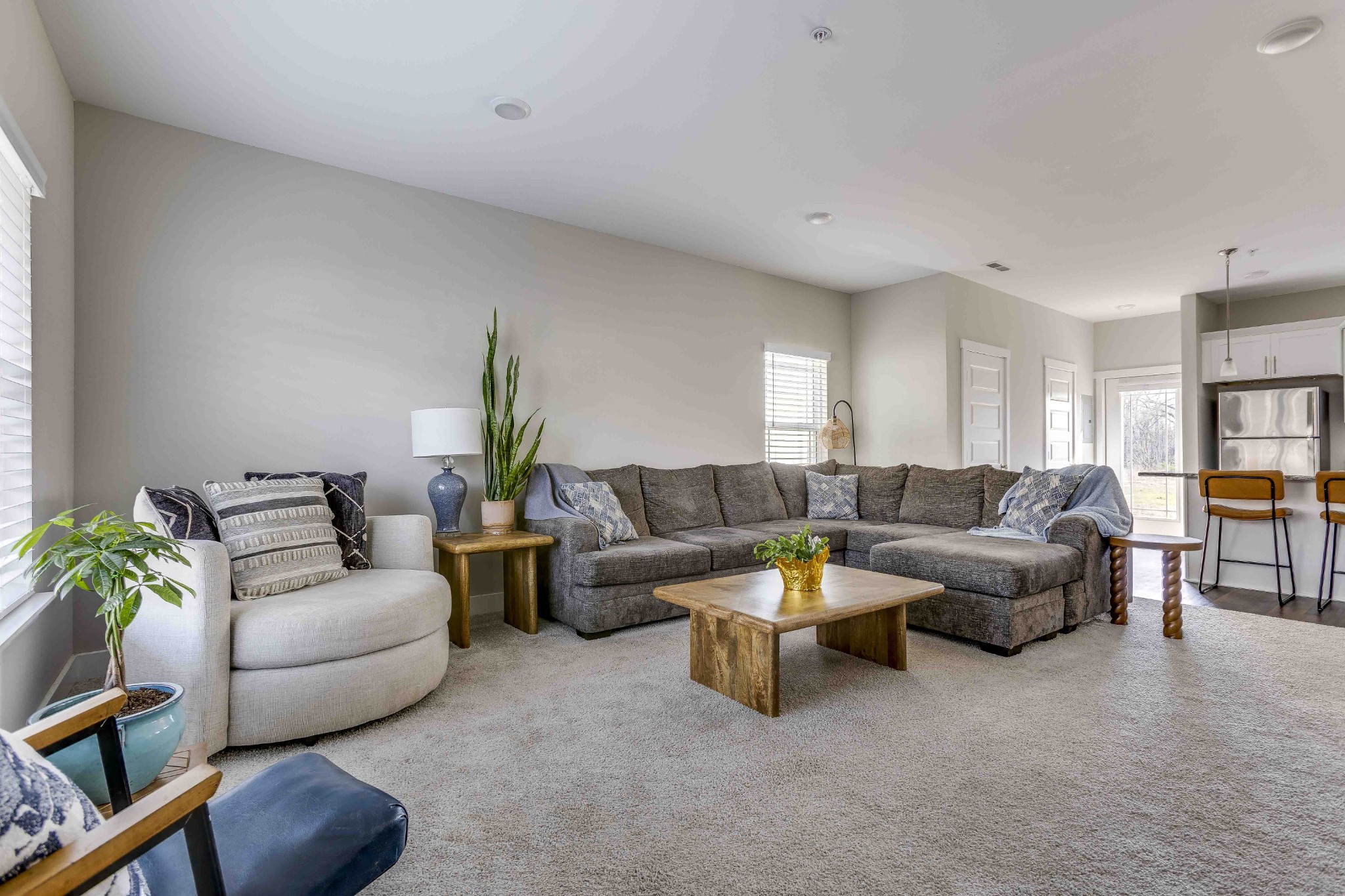 1061 Wells Way Spring Hill, TN 37174 - Photo 5 of 21 a living room with furniture and a potted plant
