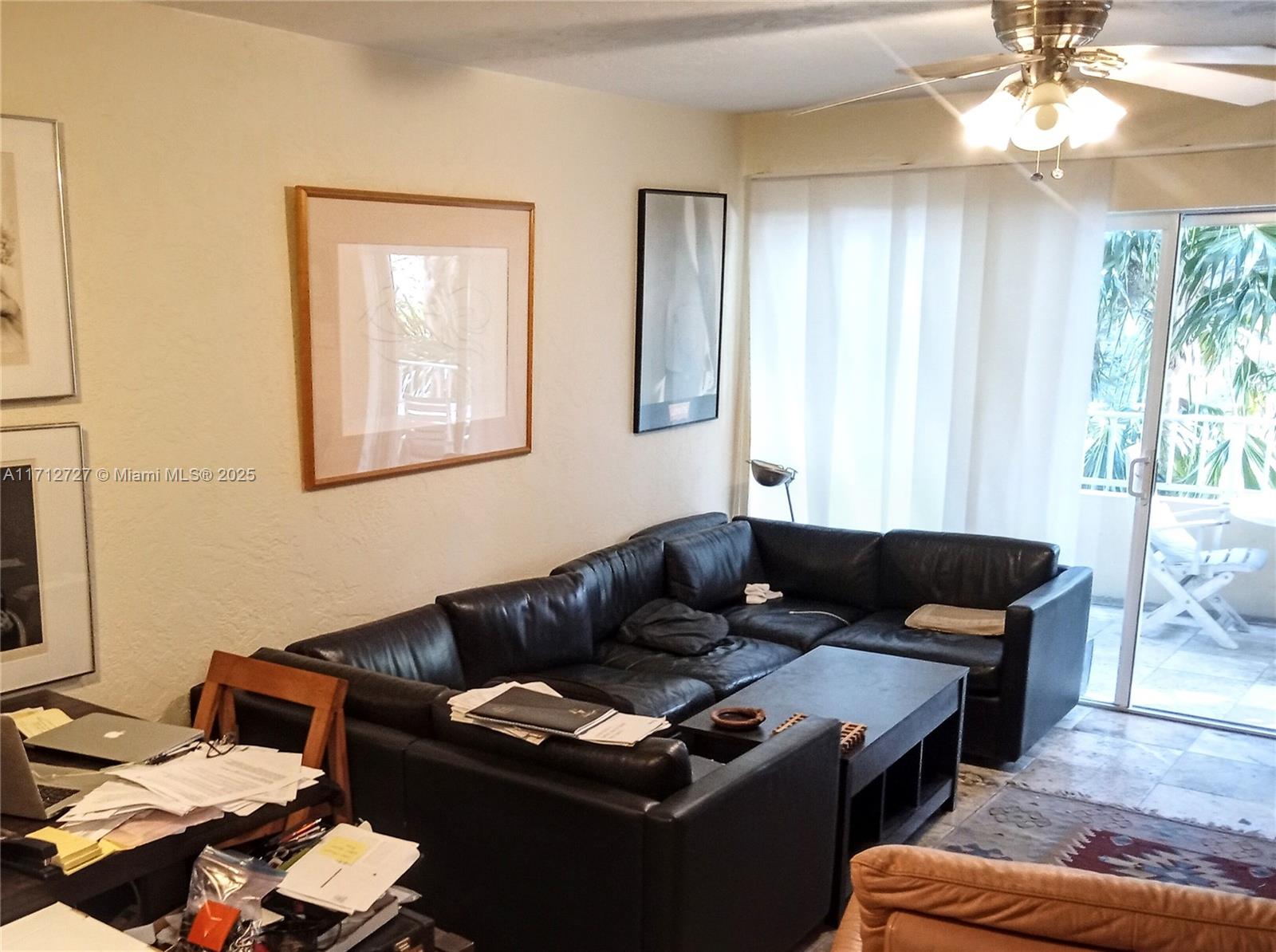 3304 Virginia Street, Unit 3B Miami, FL 33133 - Photo 4 of 9 Living room and balcony