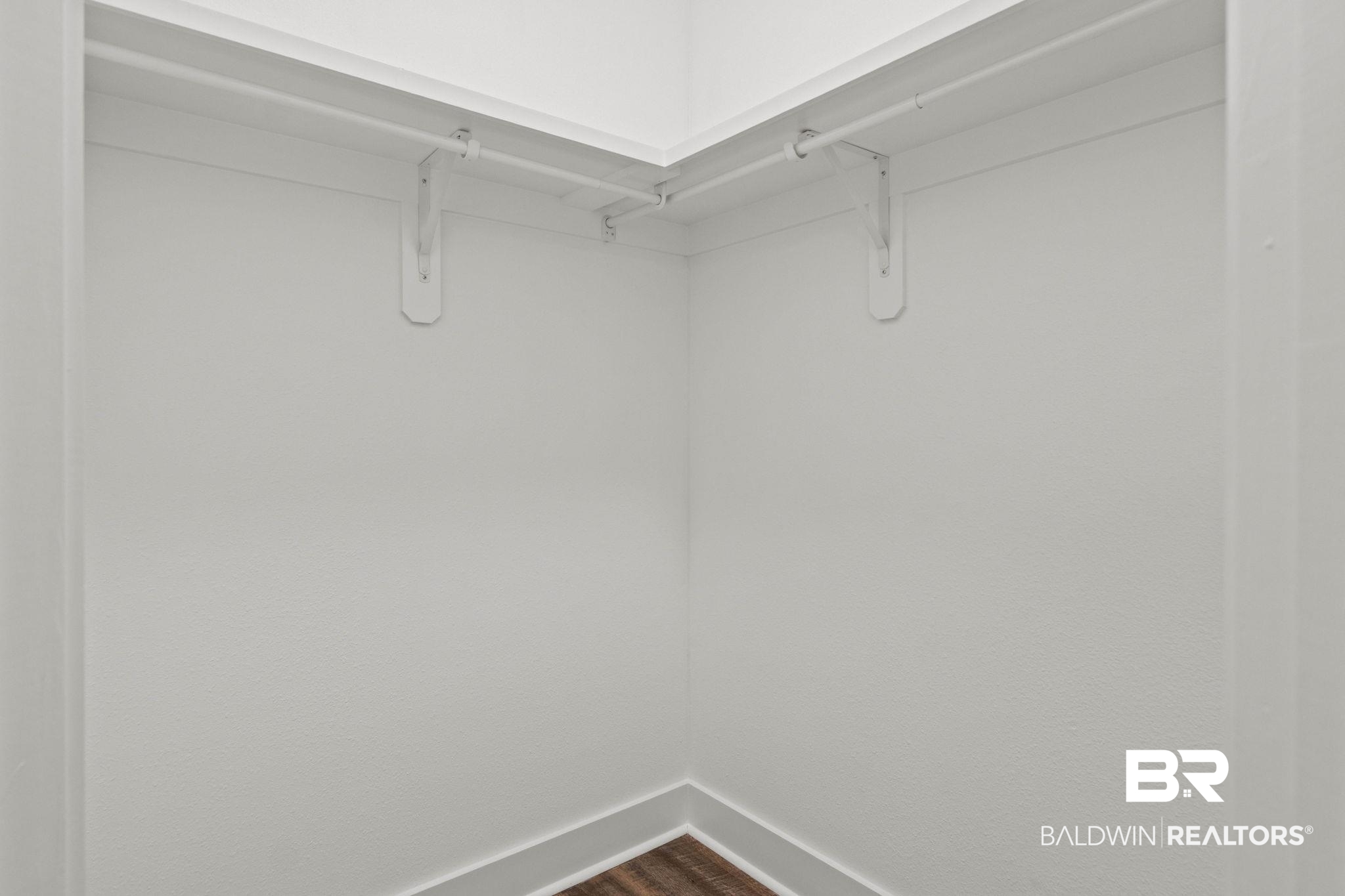 17376 Bankhead Boulevard Fairhope, AL 36532 - Photo 43 of 73 Spacious closet featuring dark wood-type flooring