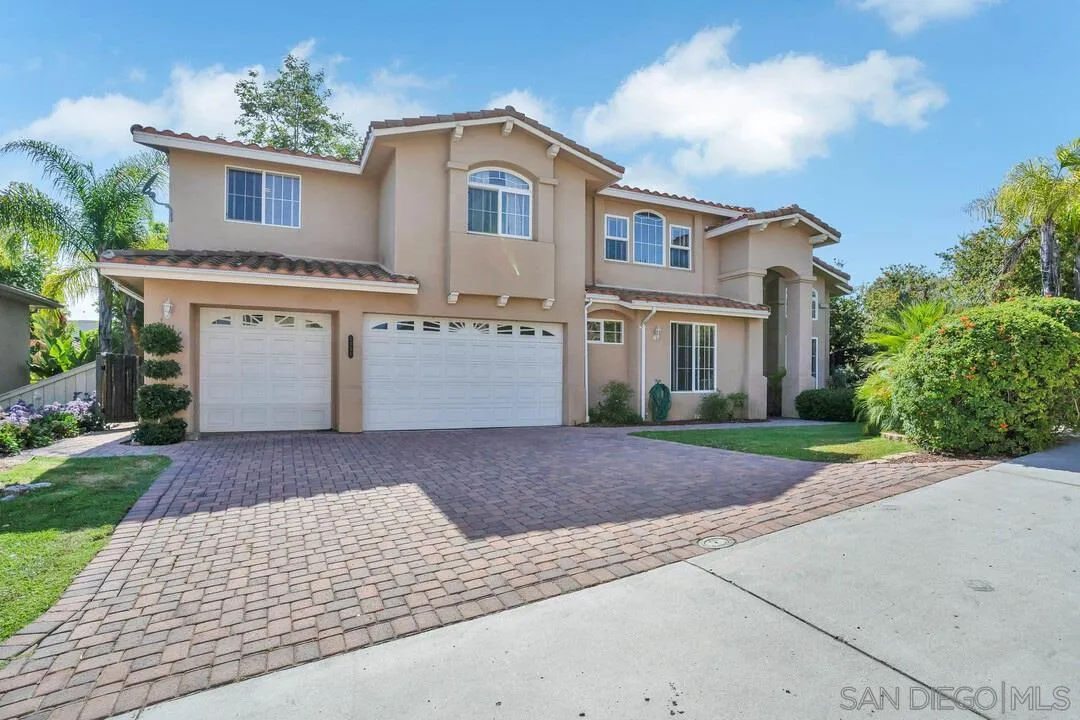 1731 Olivenhain Road Encinitas, CA 92024 - Photo 1 of 31 a front view of a house with a yard and a garage