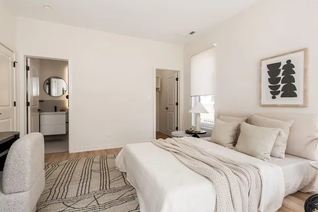 a close view of a bathroom with a sink and a mirror