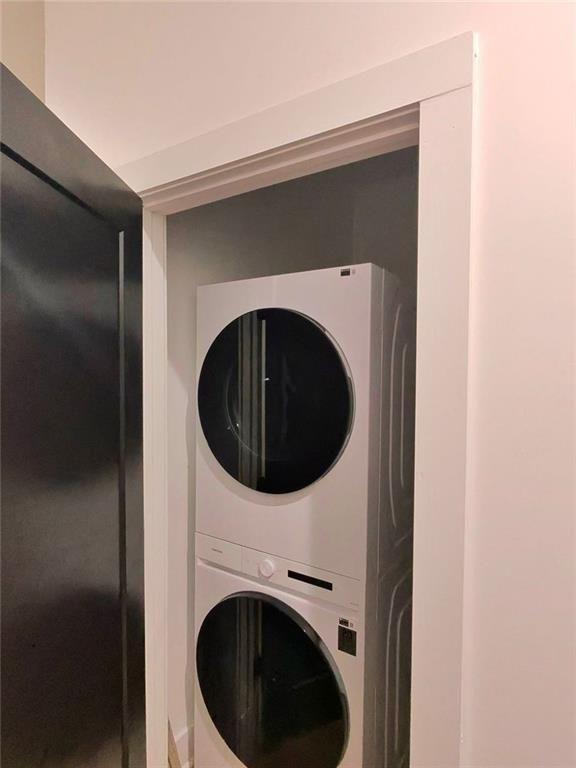 Undisclosed Address Brookhaven, GA 30319 - Photo 29 of 29 a utility room with dryer and washer