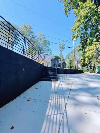 a view of balcony with wooden floor