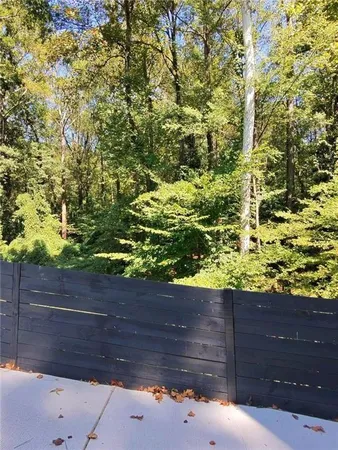 a view of a street with a bench