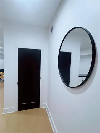 a living room with a couch and a rug