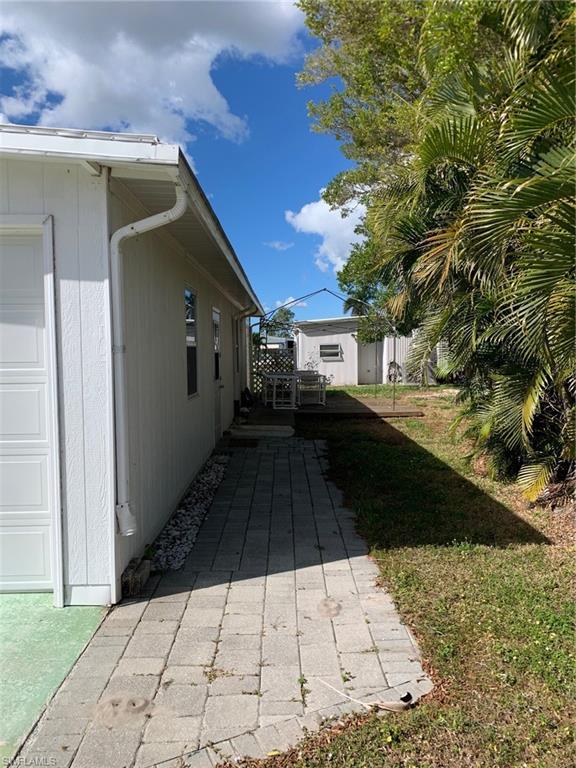 9322 Pitt Road Bonita Springs, FL 34135 - Photo 2 of 24 a view of a backyard of the house