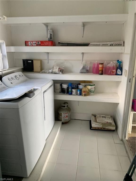 9322 Pitt Road Bonita Springs, FL 34135 - Photo 23 of 24 a utility room with washer and dryer