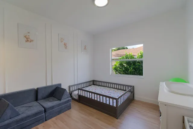 a bedroom with furniture and a couch