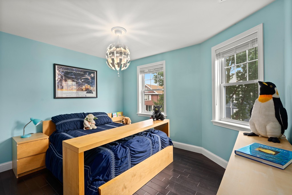 36 River Street, Unit 2 Arlington, MA 02474 - Photo 12 of 32 a bed room with furniture and a window