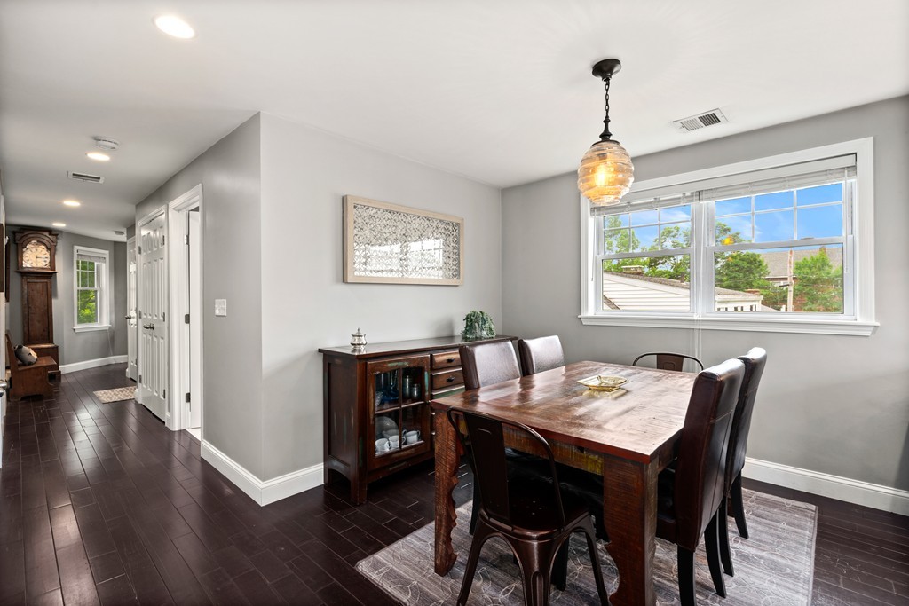36 River Street, Unit 2 Arlington, MA 02474 - Photo 3 of 32 a view of a dining room with furniture window and wooden floor