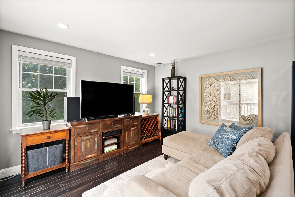 36 River Street, Unit 2 Arlington, MA 02474 - Photo 10 of 32 a living room with furniture and a flat screen tv