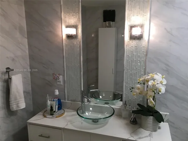 a view of a house with a yard and a garden