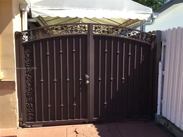 a living room with furniture a dining table and a piano