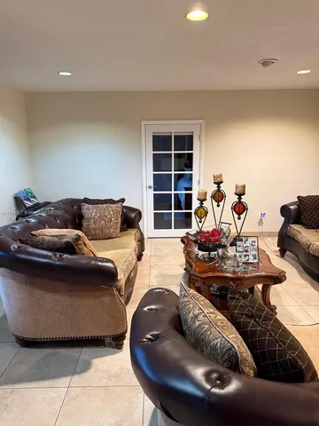 a stove top oven sitting inside of a kitchen