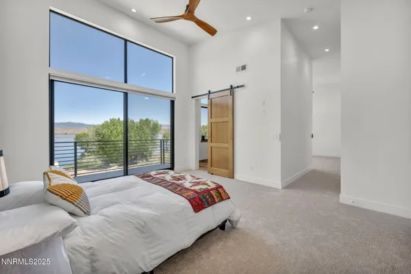 a bathroom with a toilet sink and vanity