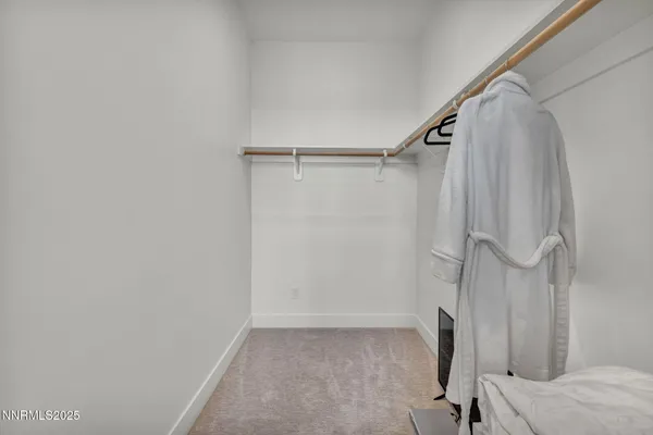 a view of a lake with a building in the background