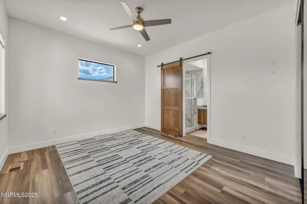 a view of a lake with couches and city view