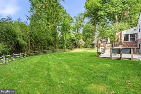 a garden view with a sitting space