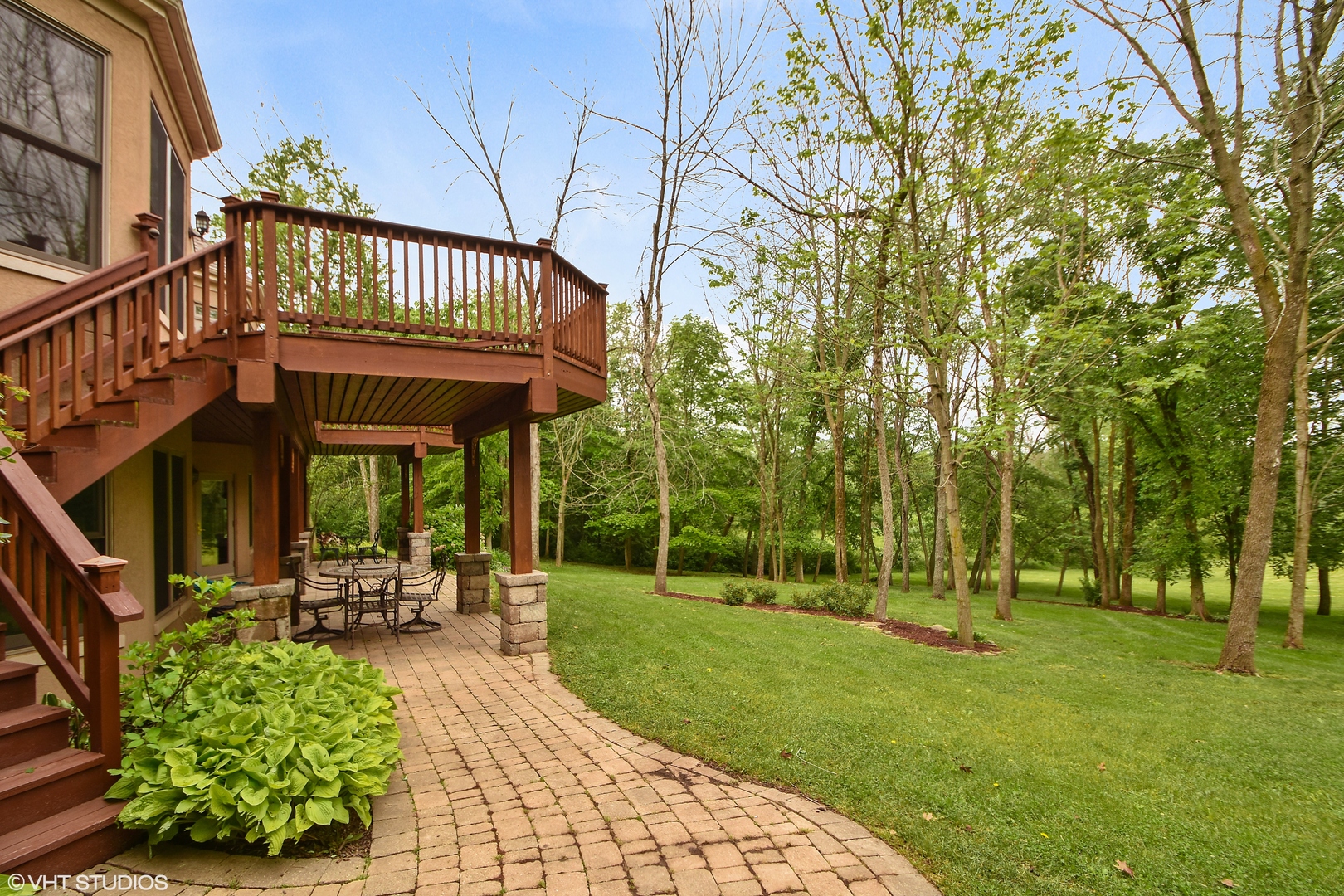 26010 West Airport Road Minooka, IL 60447 - Photo 15 of 28 a view of a chair and table in the garden