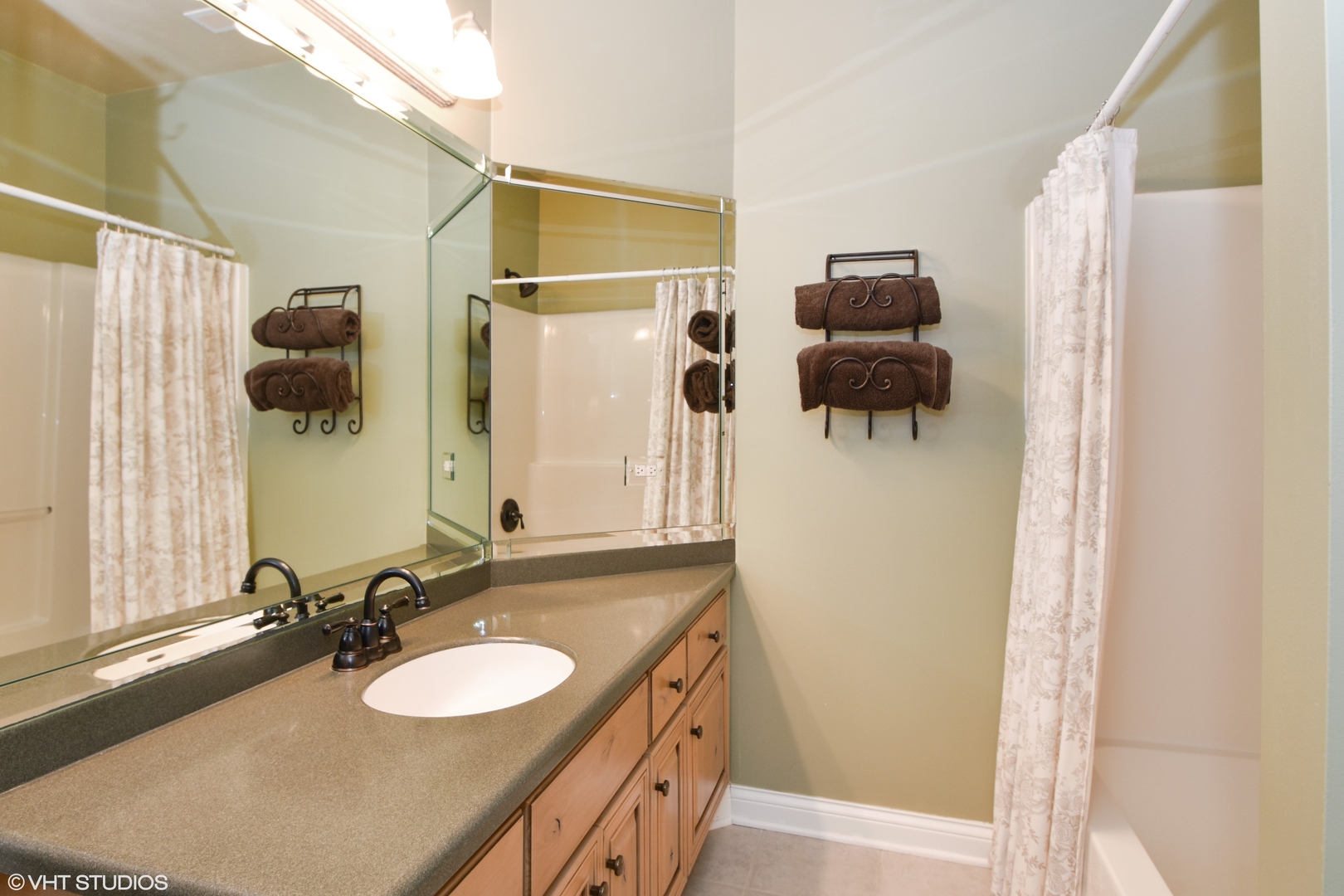 26010 West Airport Road Minooka, IL 60447 - Photo 22 of 28 a bathroom with a sink and mirror