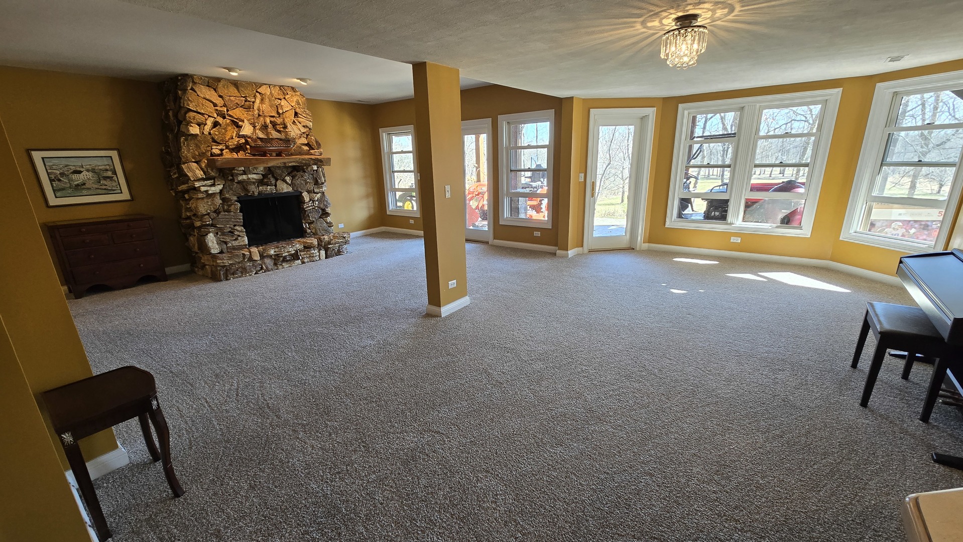 26010 West Airport Road Minooka, IL 60447 - Photo 26 of 28 a view of a livingroom with furniture and a window