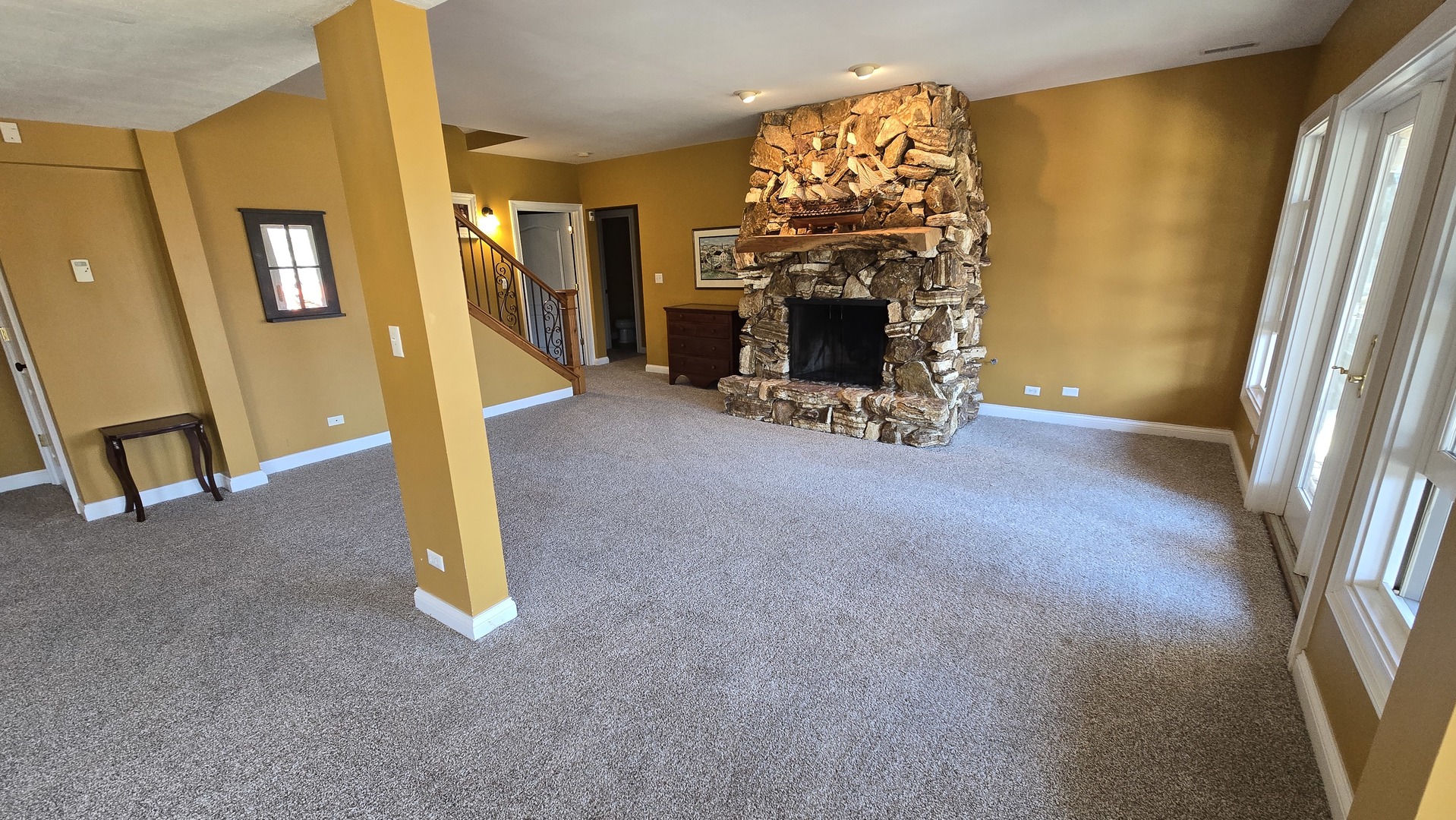 26010 West Airport Road Minooka, IL 60447 - Photo 27 of 28 a view of a livingroom with a fireplace and window
