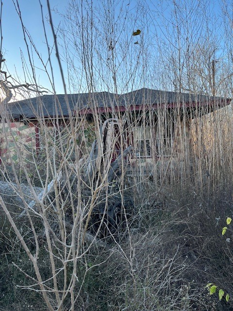 7115 Dallas Street Baytown, TX 77521 - Photo 3 of 8 a view of a backyard