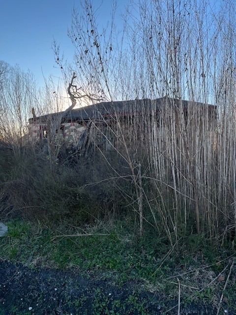 7115 Dallas Street Baytown, TX 77521 - Photo 4 of 8 a view of a backyard