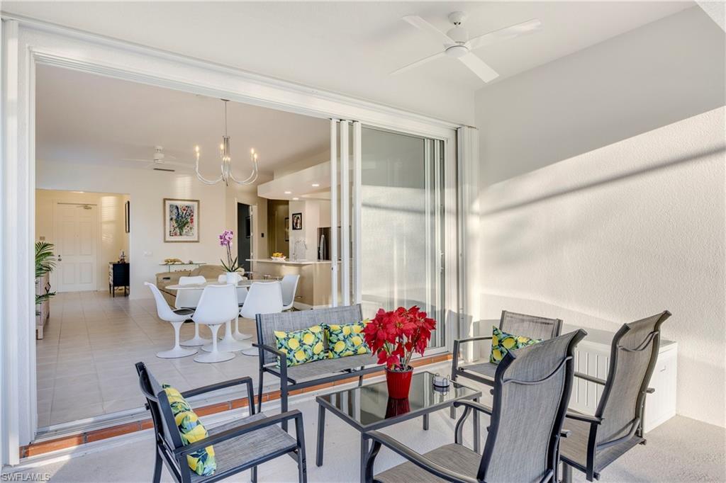 4708 Rio Poco Court Naples, FL 34109 - Photo 17 of 37 View of patio featuring ceiling fan and outdoor dining space