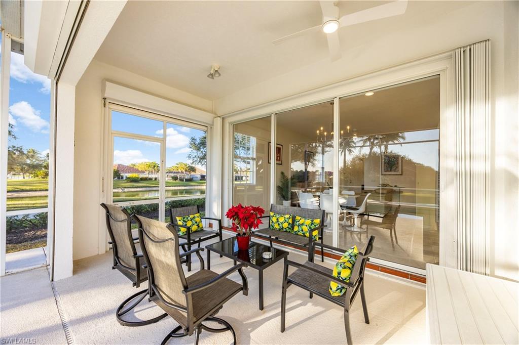 4708 Rio Poco Court Naples, FL 34109 - Photo 30 of 37 Sunroom / solarium with a water view