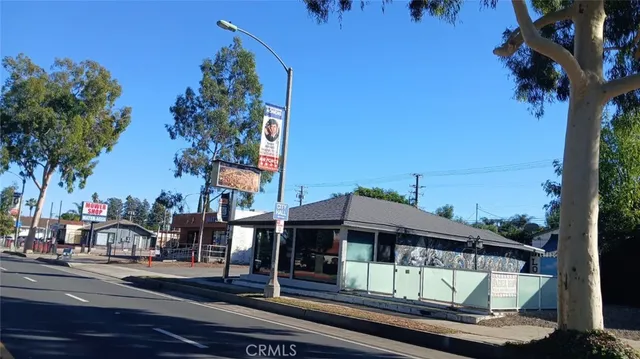 a front view of a building with street view