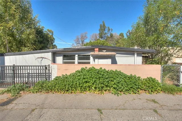 front view of a house with a street