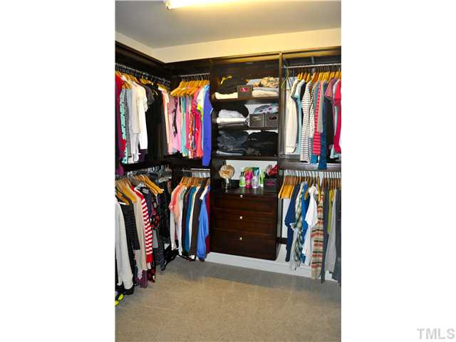 808 Pirouette Court Raleigh, NC 27606 - Photo 11 of 25 Now that's a custom closet system! A space for everything. Master Suite